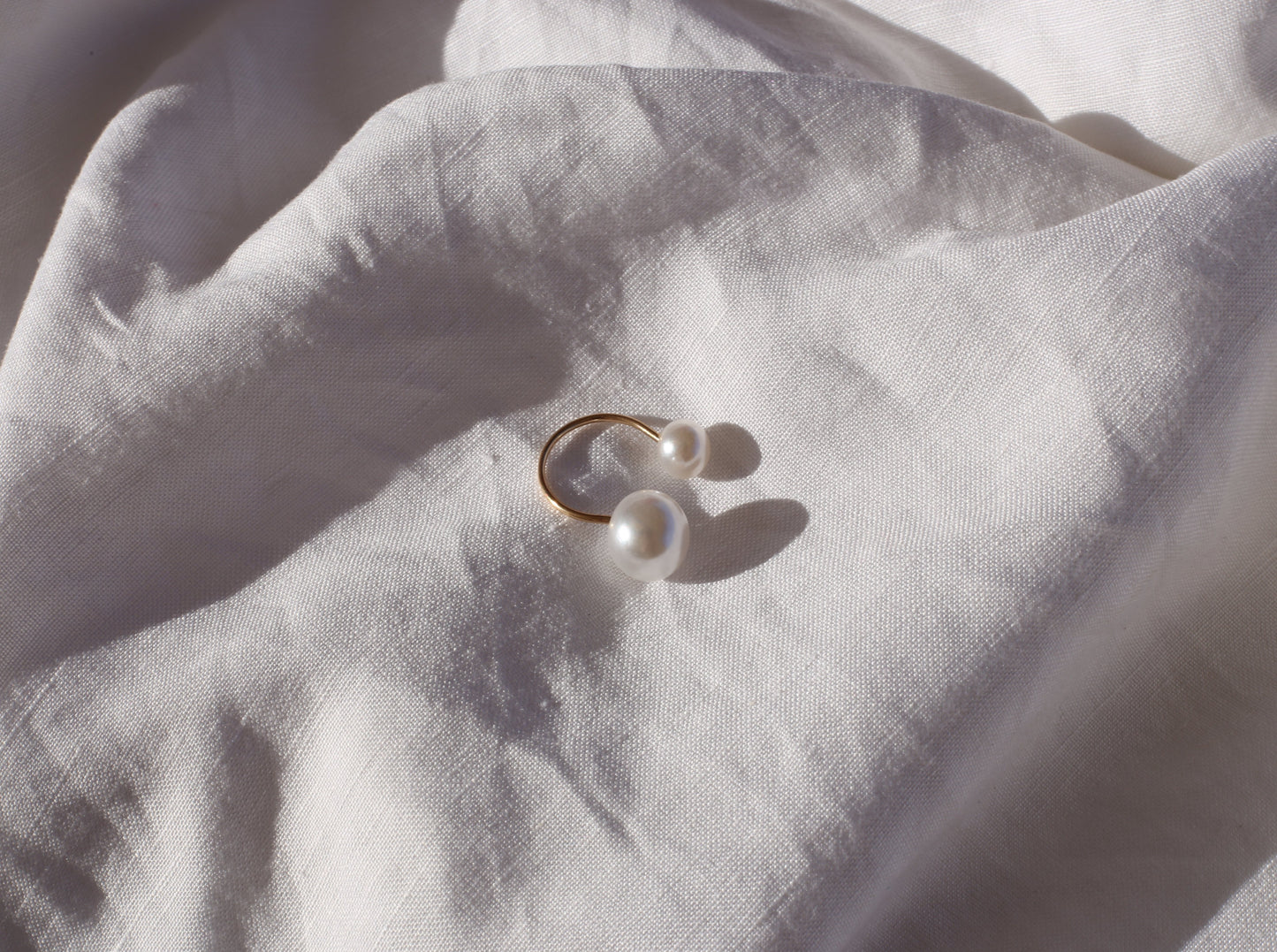 Anillo doble perla ajustable